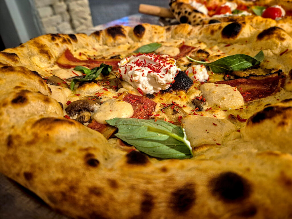 Pizza cu bacon, la Pretty Pizza, în Munchen